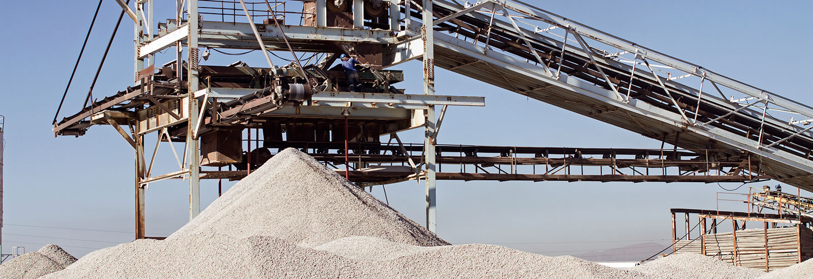 Heap of Building stone coming out of machine